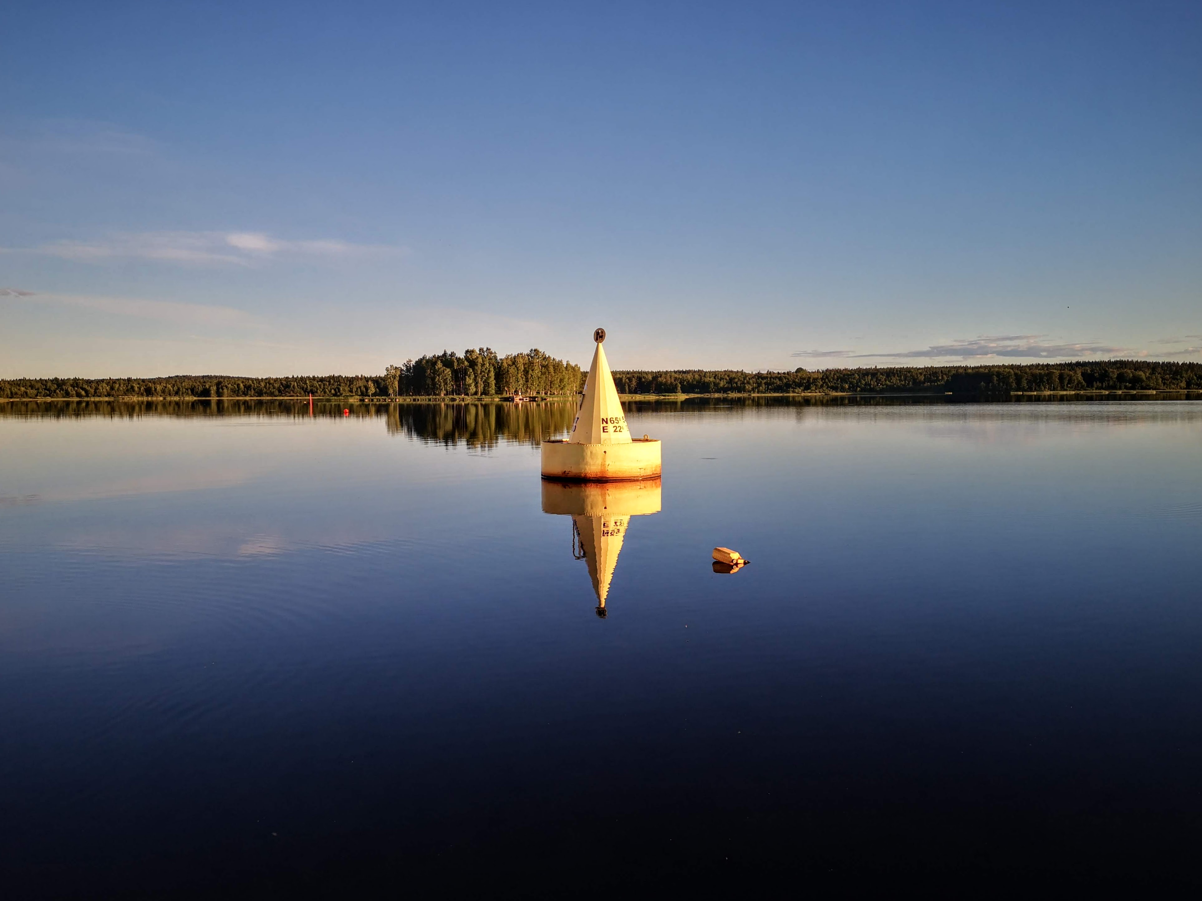 The northernmost buoy of the Bay of Bothnia at golden hour