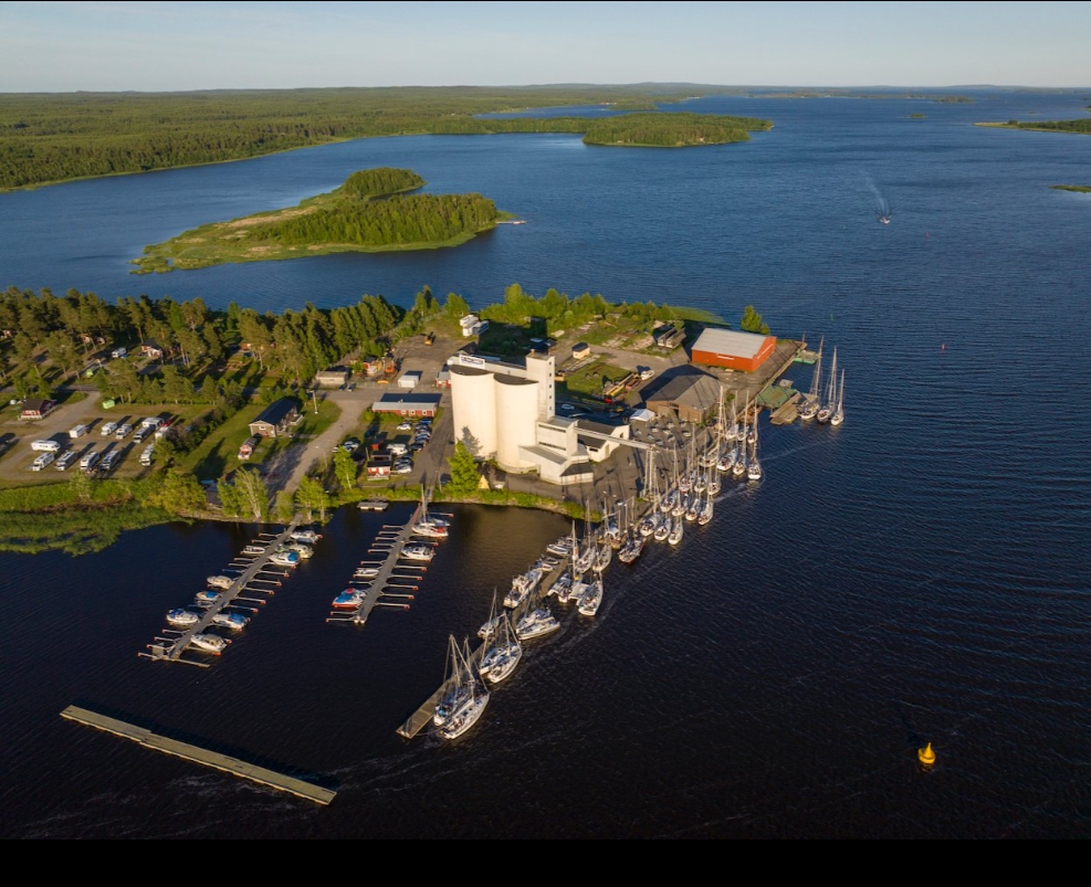 Aerial view of Töre harbor with sailboats and the Bay of Bothnia